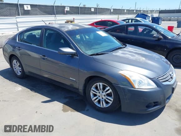 ✅ 2010 Nissan Altima Hybrid • VIN: 1N4CL2AP6AC111802 • Lot: 42228601. Wystawiony na IAAI z przebiegiem 284 487 mil. Bezpłatny archiwum sprzedaży aukcyjnych z USA i szczegółowy raport historii pojazdu na DreamBid. Zdjęcie 1.