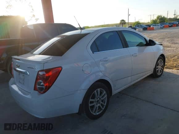 2014 Chevrolet Sonic LT with VIN 1G1JC5SG9E4127762, listed as a IAAI auction lot 43521388 with 128,333 mi miles and . Bid and sale history available at DreamBid. Image 4.
