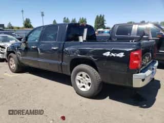 2005 Dodge Dakota SLT z VIN 1D7HW48N05S252860, wystawiony jako Copart lot #60751084 z przebiegiem 135 514 mil mil oraz Szkoda całkowita • Salvage title. Historia ofert i sprzedaży dostępna na DreamBid. Obrazek 2.