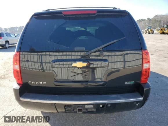 ✅ 2012 Chevrolet Tahoe LTZ • VIN: 1GNSCCE01CR276608 • Lot: 88820715. Listed on Copart with 112,976 mi. Free auction sales archive from the USA and detailed vehicle history report at DreamBid. Image 6.