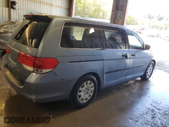 ✅ 2010 Honda Odyssey LX • VIN: 5FNRL3H25AB002903 • Lot: 81052015. Listed on Copart with 100,199 mi. Free auction sales archive from the USA and detailed vehicle history report at DreamBid. Image 3.