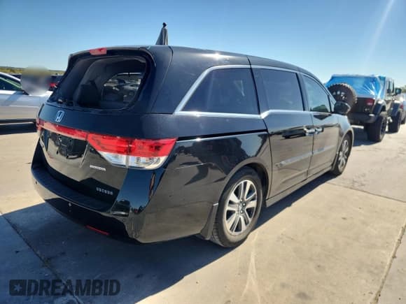 ✅ 2014 Honda Odyssey Touring • VIN: 5FNRL5H96EB078323 • Lot: 89666745. Listed on Copart with 150,898 mi. Free auction sales archive from the USA and detailed vehicle history report at DreamBid. Image 3.