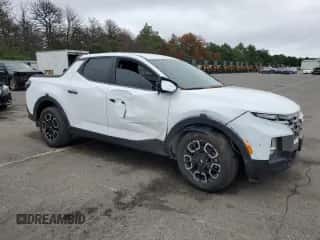 2022 Hyundai Santa Cruz SEL z VIN 5NTJBDAE9NH009503, wystawiony jako Copart lot #64002324 z przebiegiem 60 043 mil mil oraz Szkoda całkowita • Salvage title. Historia ofert i sprzedaży dostępna na DreamBid. Obrazek 4.