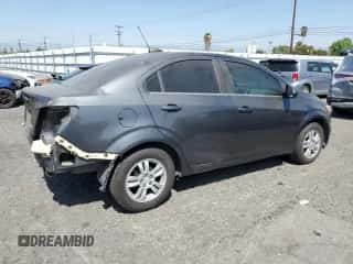 2016 Chevrolet Sonic LT с VIN 1G1JC5SGXG4154729, выставлен на аукционе Copart как лот 72806644 с пробегом 103 093 миль миль и Списание • Salvage title. История ставок и продаж доступна на DreamBid. Изображение 3.