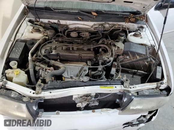 ✅ 1997 Nissan Altima XE • VIN: 1N4BU31D2VC153538 • Lot: 92502105. Listed on Copart with 146,779 mi. Free auction sales archive from the USA and detailed vehicle history report at DreamBid. Image 11.