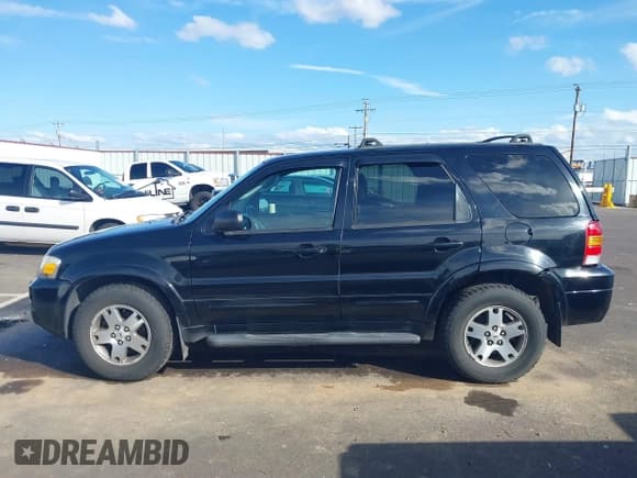 ✅ 2005 Ford Escape Limited • VIN: 1FMYU94125KA49934 • Lot: 41735243. Listed on IAAI with 118,041 mi. Free auction sales archive from the USA and detailed vehicle history report at DreamBid. Image 14.