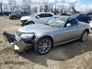 ✅ 2010 Mazda MX-5 Miata Grand Touring • VIN: JM1NC2FF5A0205822 • Lot: 45564895. Wystawiony na Copart z przebiegiem 48 844 mil. Bezpłatny archiwum sprzedaży aukcyjnych z USA i szczegółowy raport historii pojazdu na DreamBid. Zdjęcie 1.
