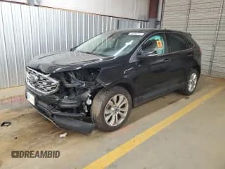 ✅ 2022 Ford Edge Titanium • VIN: 2FMPK4K93NBA54812 • Lot: 90880715. Wystawiony na Copart z przebiegiem 97 062 mil. Bezpłatny archiwum sprzedaży aukcyjnych z USA i szczegółowy raport historii pojazdu na DreamBid. Zdjęcie 1.