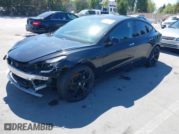 ✅ 2018 Tesla Model 3 Long Range Battery • VIN: 5YJ3E1EA7JF011411 • Lot: 42227015. Listed on IAAI with 156,549 mi. Free auction sales archive from the USA and detailed vehicle history report at DreamBid. Image 19.