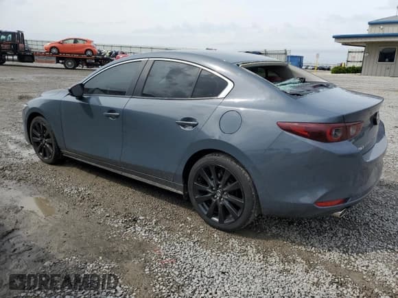 ✅ 2022 Mazda 3 Carbon Edition • VIN: 3MZBPACL1NM309042 • Lot: 51786535. Listed on Copart with 40,053 mi. Free auction sales archive from the USA and detailed vehicle history report at DreamBid. Image 2.