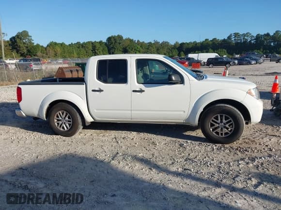 ✅ 2019 Nissan Frontier SL • VIN: 1N6AD0ER0KN740702 • Lot: 43360402. Listed on IAAI with 142,173 mi. Free auction sales archive from the USA and detailed vehicle history report at DreamBid. Image 13.