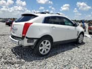 ✅ 2013 Cadillac SRX Performance Collection • VIN: 3GYFNDE38DS631335 • Lot: 60399855. Listed on Copart with 69,395 mi. Free auction sales archive from the USA and detailed vehicle history report at DreamBid. Image 3.