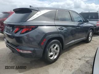 ✅ 2022 Hyundai Tucson SE • VIN: 5NMJA3AE2NH011764 • Lot: 74392024. Wystawiony na Copart z przebiegiem Nie podano. Bezpłatny archiwum sprzedaży aukcyjnych z USA i szczegółowy raport historii pojazdu na DreamBid. Zdjęcie 3.