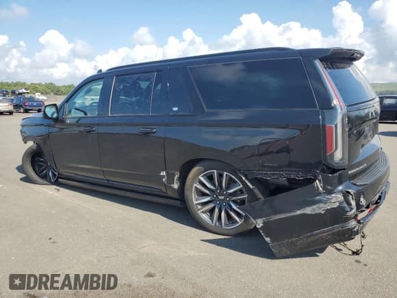 ✅ 2023 Cadillac Escalade ESV 4WD Sport Platinum • VIN: 1GYS4RKL6PR231414 • Лот: 64904735. Опубликован ранее на Copart с пробегом 95 666 миль. Бесплатный доступ к архиву аукционных продаж из США и подробный отчёт об истории автомобиля на DreamBid. Изображение 2.