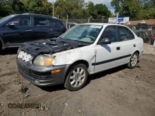 2004 Hyundai Accent GL with VIN KMHCG45C94U500705, listed as a Copart auction lot 85166135 with 87,381 mi miles and Salvage title. Bid and sale history available at DreamBid. Image 1.