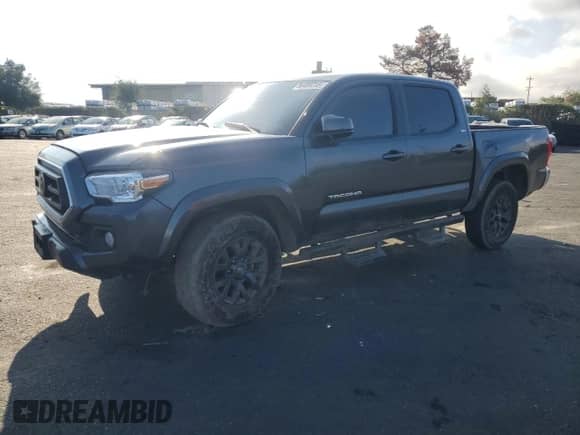 2022 Toyota Tacoma SR5 with VIN 3TMAZ5CN1NM186280, listed as a Copart auction lot 86409735 with 38,852 mi miles and Salvage title. Bid and sale history available at DreamBid. Image 1.