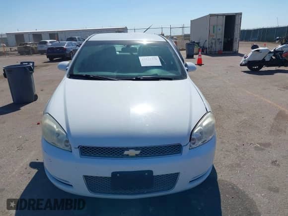 2013 Chevrolet Impala LS with VIN 2G1WF5E37D1141434, listed as a IAAI auction lot 43322378 with 159,237 mi miles and . Bid and sale history available at DreamBid. Image 12.