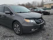 ✅ 2014 Honda Odyssey Touring • VIN: 5FNRL5H92EB056545 • Lot: 93947975. Listed on Copart with 98,901 mi. Free auction sales archive from the USA and detailed vehicle history report at DreamBid. Image 14.