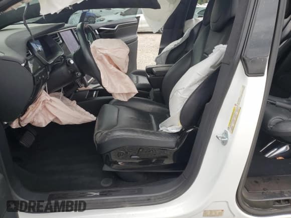 ✅ 2016 Tesla Model X 70D • VIN: 5YJXCBE2XGF002765 • Lot: 81441805. Listed on Copart with 104,304 mi. Free auction sales archive from the USA and detailed vehicle history report at DreamBid. Image 7.