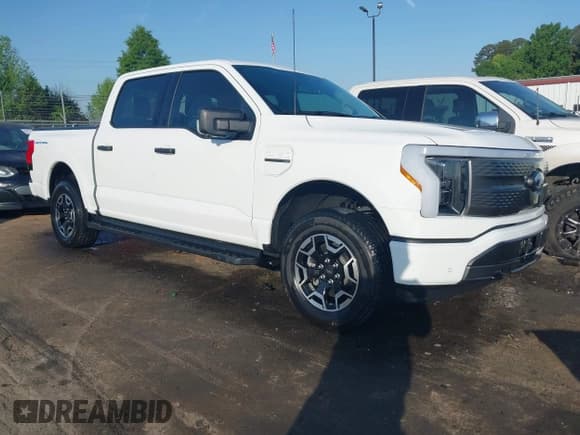 ✅ 2023 Ford F-150 Lightning Pro • VIN: 1FTVW1EL6PWG34059 • Лот: 42010900. Опубликован ранее на IAAI с пробегом 20 759 миль. Бесплатный доступ к архиву аукционных продаж из США и подробный отчёт об истории автомобиля на DreamBid. Изображение 1.