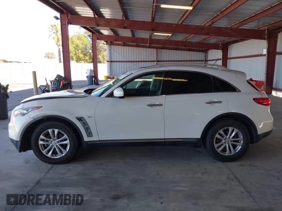 ✅ 2016 Infiniti QX70 • VIN: JN8CS1MW3GM750320 • Lot: 43430258. Listed on IAAI with 194,716 mi. Free auction sales archive from the USA and detailed vehicle history report at DreamBid. Image 14.