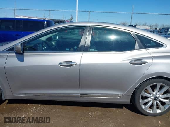 2013 Hyundai Azera с VIN KMHFH4JG3DA220430, выставлен на аукционе IAAI как лот 41805191 с пробегом 101 610 миль миль и . История ставок и продаж доступна на DreamBid. Изображение 14.