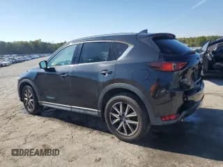 ✅ 2018 Mazda CX-5 Grand Touring • VIN: JM3KFADM2J1345415 • Lot: 87199005. Listed on Copart with 138,398 mi. Free auction sales archive from the USA and detailed vehicle history report at DreamBid. Image 2.