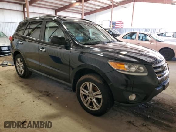 ✅ 2012 Hyundai Santa Fe Limited • VIN: 5XYZKDAG1CG109277 • Lot: 87080084. Listed on Copart with 86,219 mi. Free auction sales archive from the USA and detailed vehicle history report at DreamBid. Image 4.