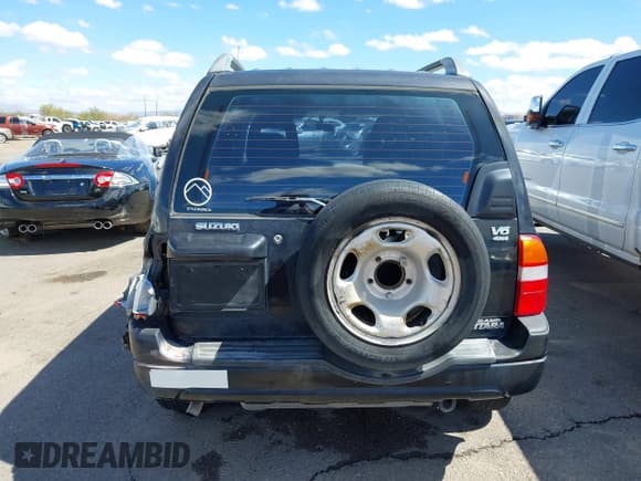 ✅ 2001 Suzuki Grand Vitara JLX • VIN: JS3TD62V414156342 • Lot: 41762508. Listed on IAAI with 214,235 mi. Free auction sales archive from the USA and detailed vehicle history report at DreamBid. Image 17.