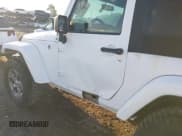 ✅ 2018 Jeep Wrangler Sahara • VIN: 1C4AJWBG2JL821132 • Lot: 42523688. Listed on IAAI with 86,244 mi. Free auction sales archive from the USA and detailed vehicle history report at DreamBid. Image 18.