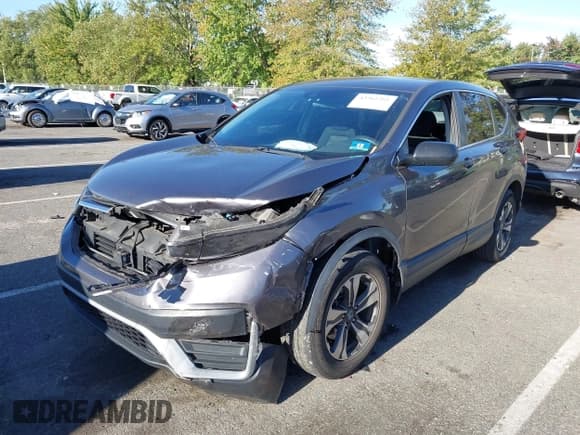 ✅ 2020 Honda CR-V LX • VIN: 2HKRW2H20LH608275 • Lot: 43361281. Listed on IAAI with 124,491 mi. Free auction sales archive from the USA and detailed vehicle history report at DreamBid. Image 2.