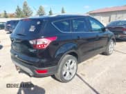 ✅ 2017 Ford Escape Titanium • VIN: 1FMCU9J96HUC94393 • Lot: 43519468. Listed on IAAI with 92,135 mi. Free auction sales archive from the USA and detailed vehicle history report at DreamBid. Image 4.