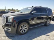 ✅ 2015 GMC Yukon Denali • VIN: 1GKS2CKJ2FR604815 • Lot: 80201135. Listed on Copart with 228,266 mi. Free auction sales archive from the USA and detailed vehicle history report at DreamBid. Image 1.