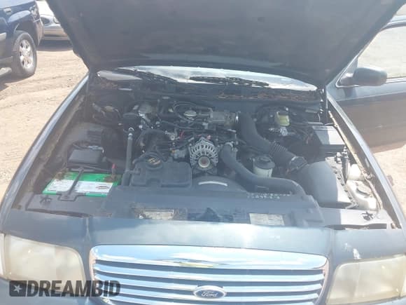 ✅ 1999 Ford Crown Victoria LX • VIN: 2FAFP74W6XX119265 • Lot: 42979924. Listed on IAAI with 115,216 mi. Free auction sales archive from the USA and detailed vehicle history report at DreamBid. Image 10.