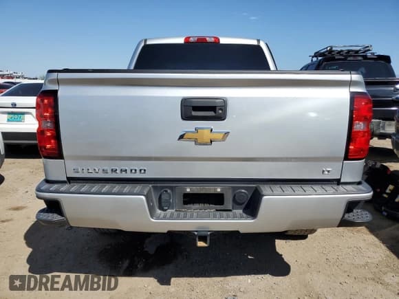 ✅ 2018 Chevrolet Silverado 1500 LT • VIN: 3GCUKRECXJG281787 • Лот: 72825244. Опубликован ранее на Copart с пробегом 68 284 миль. Бесплатный доступ к архиву аукционных продаж из США и подробный отчёт об истории автомобиля на DreamBid. Изображение 6.