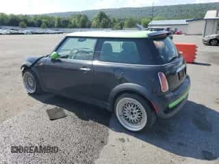 2003 MINI Hardtop with VIN WMWRC33443TE16974, listed as a Copart auction lot 62366375 with 131,981 mi miles and Salvage title. Bid and sale history available at DreamBid. Image 2.