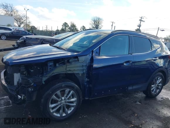 ✅ 2017 Hyundai Santa Fe 2.0T • VIN: 5XYZU4LA6HG401159 • Lot: 43806120. Listed on IAAI with 54,032 mi. Free auction sales archive from the USA and detailed vehicle history report at DreamBid. Image 14.