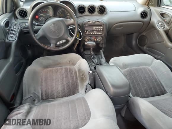 ✅ 2004 Pontiac Grand Am GT • VIN: 1G2NW52E34M636201 • Лот: 79112994. Опубликован ранее на Copart с пробегом 108 409 миль. Бесплатный доступ к архиву аукционных продаж из США и подробный отчёт об истории автомобиля на DreamBid. Изображение 8.