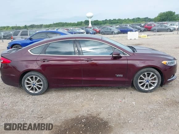 ✅ 2017 Ford Fusion Titanium • VIN: 3FA6P0SU4HR209636 • Лот: 42539581. Опубликован ранее на IAAI с пробегом 174 600 миль. Бесплатный доступ к архиву аукционных продаж из США и подробный отчёт об истории автомобиля на DreamBid. Изображение 13.