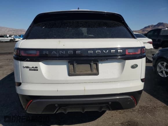 ✅ 2018 Land Rover Range Rover Velar R-Dynamic SE • VIN: SALYL2RX0JA710784 • Lot: 70834045. Wystawiony na Copart z przebiegiem 164 263 mil. Bezpłatny archiwum sprzedaży aukcyjnych z USA i szczegółowy raport historii pojazdu na DreamBid. Zdjęcie 6.
