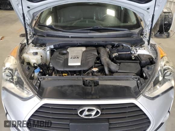 2014 Hyundai Veloster Turbo z VIN KMHTC6AE2EU208474, wystawiony jako Copart lot #65442584 z przebiegiem 57 596 mil mil oraz Szkoda całkowita • Salvage title. Historia ofert i sprzedaży dostępna na DreamBid. Obrazek 11.