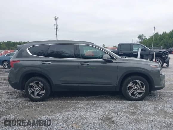 2023 Hyundai Santa Fe SEL with VIN 5NMS2DAJ3PH627917, listed as a IAAI auction lot 43565855 with 57,979 mi miles and . Bid and sale history available at DreamBid. Image 13.