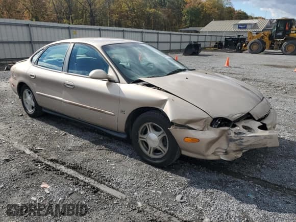 ✅ 1999 Ford Taurus SE • VIN: 1FAFP53S0XA141970 • Lot: 89710195. Listed on Copart with 170,401 mi. Free auction sales archive from the USA and detailed vehicle history report at DreamBid. Image 4.