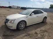 ✅ 2011 Cadillac CTS Performance • VIN: 1G6D25EY6B0127235 • Lot: 80989855. Listed on Copart with 104,526 mi. Free auction sales archive from the USA and detailed vehicle history report at DreamBid. Image 1.