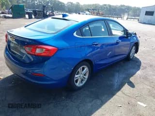 ✅ 2016 Chevrolet Cruze LT • VIN: 1G1BE5SM3G7251421 • Lot: 43294353. Listed on IAAI with 124,676 mi. Free auction sales archive from the USA and detailed vehicle history report at DreamBid. Image 4.