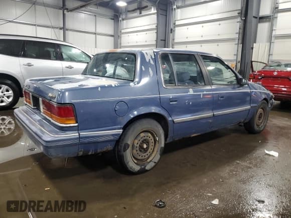 ✅ 1991 Dodge Spirit • VIN: 1B3XA46K9MF628235 • Lot: 83581274. Listed on Copart with 117,774 mi. Free auction sales archive from the USA and detailed vehicle history report at DreamBid. Image 3.