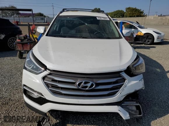 ✅ 2018 Hyundai Santa Fe 2.0T • VIN: 5XYZU4LA0JG554836 • Лот: 65013984. Опубликован ранее на Copart с пробегом 102 398 миль. Бесплатный доступ к архиву аукционных продаж из США и подробный отчёт об истории автомобиля на DreamBid. Изображение 5.