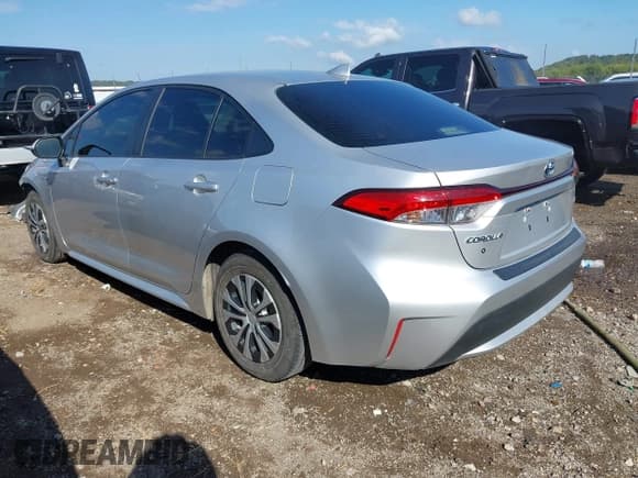 ✅ 2021 Toyota Corolla Hybrid LE • VIN: JTDEAMDE2MJ001330 • Lot: 43236132. Listed on IAAI with 181,854 mi. Free auction sales archive from the USA and detailed vehicle history report at DreamBid. Image 3.