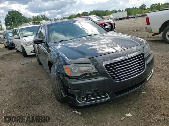 ✅ 2014 Chrysler 300 S • VIN: 2C3CCAGG2EH331537 • Lot: 70134915. Listed on Copart with 205,928 mi. Free auction sales archive from the USA and detailed vehicle history report at DreamBid. Image 13.