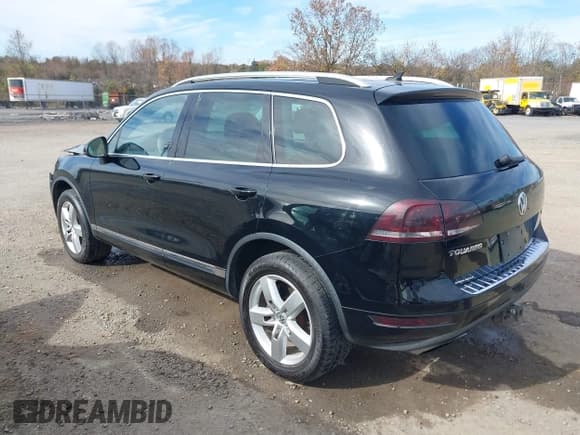 ✅ 2011 Volkswagen Touareg Sport • VIN: WVGFF9BP5BD000803 • Лот: 43596680. Опубликован ранее на IAAI с пробегом 107 740 миль. Бесплатный доступ к архиву аукционных продаж из США и подробный отчёт об истории автомобиля на DreamBid. Изображение 3.